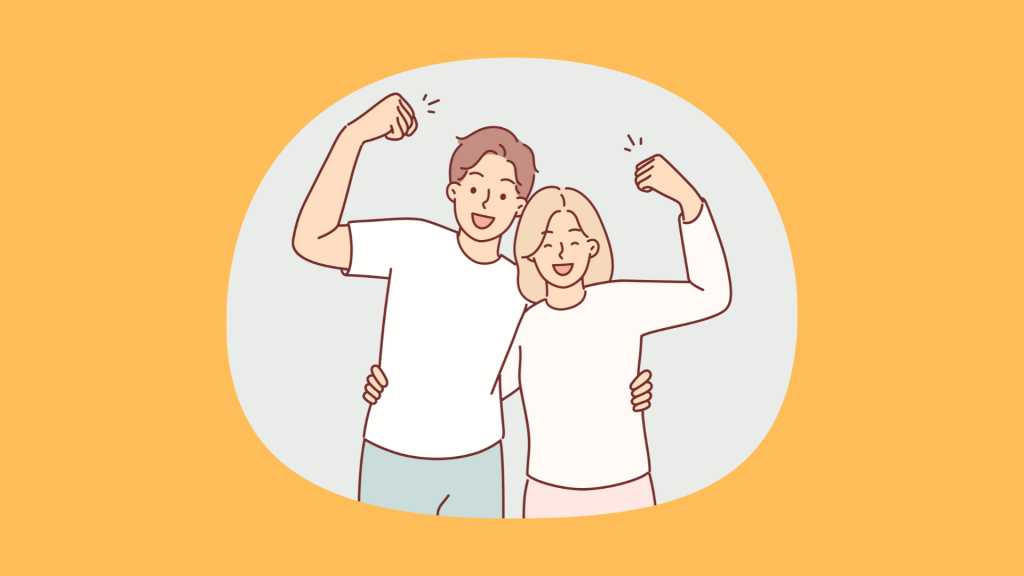 拳をかかげる二人の人